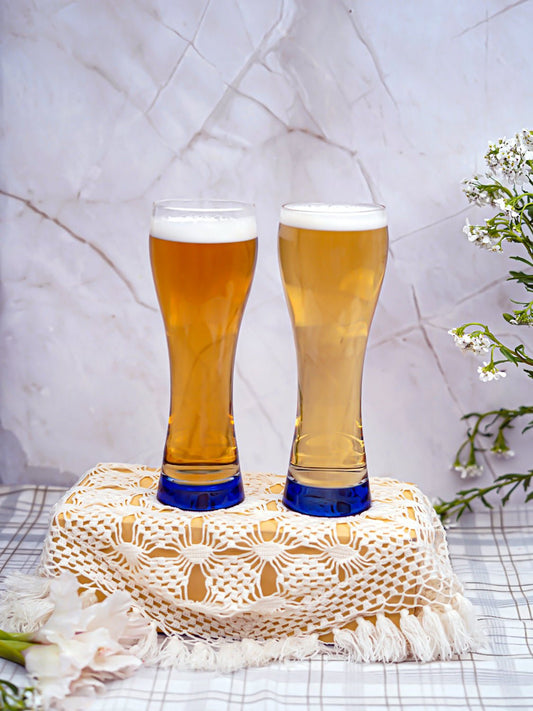 Elegant 400ml borosilicate pilsner glass, 75mm diameter, designed for beer lovers who appreciate style and durability.